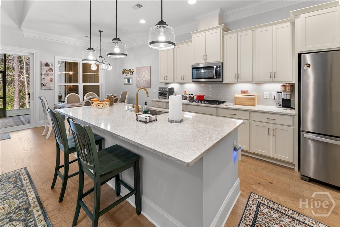 10 Golf Drive Pooler, GA 31322 - Photo 19 of 59 Kitchen and Island, Dining Room