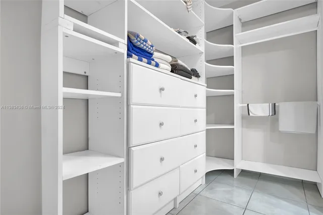 a view of an empty walk in closet