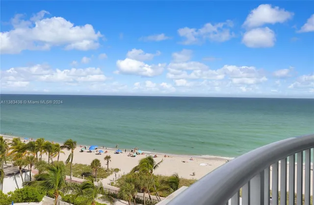 a view of an ocean from a balcony