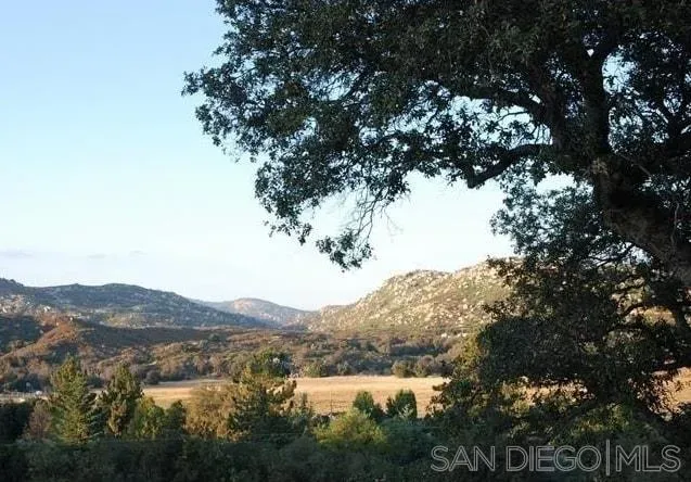 a view of lake with mountain