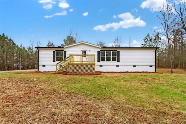 a house view with a garden space