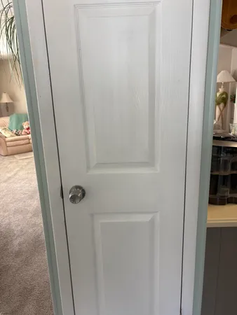 a bathroom with a shower and a sink