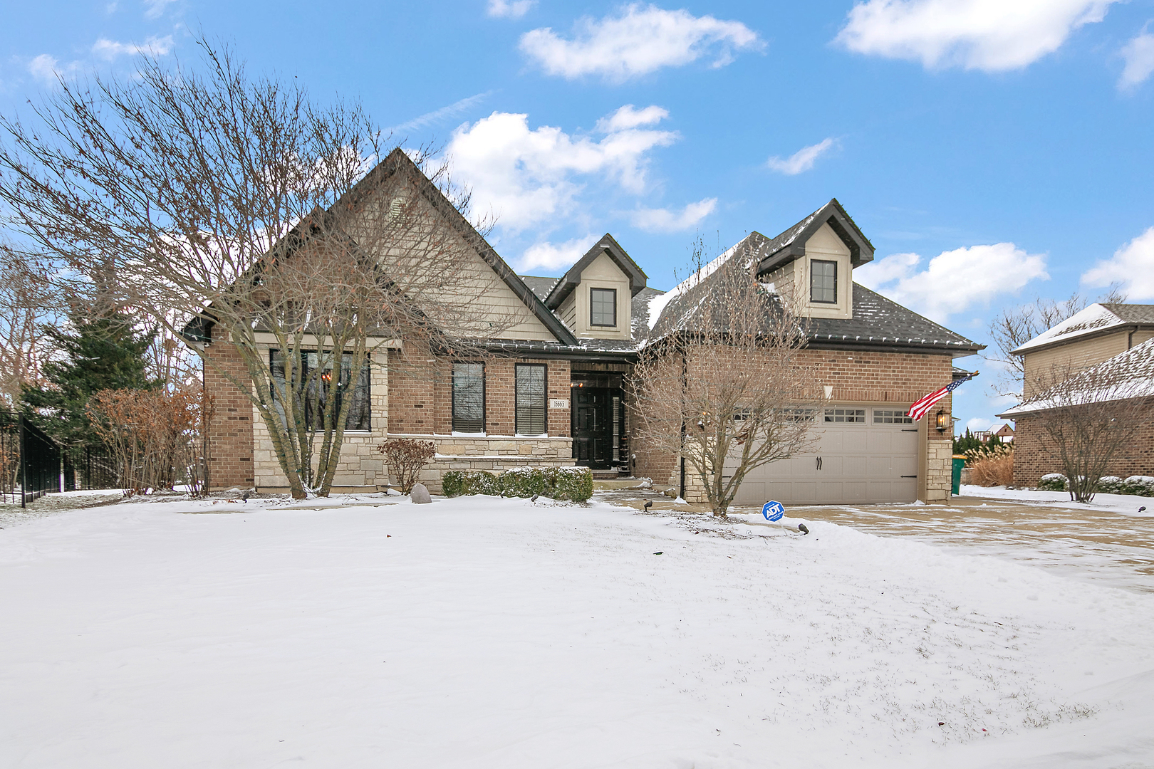 16665 Merc Lane Lockport, IL 60441 - Photo 1 of 54 a view of large house with a snow on the road