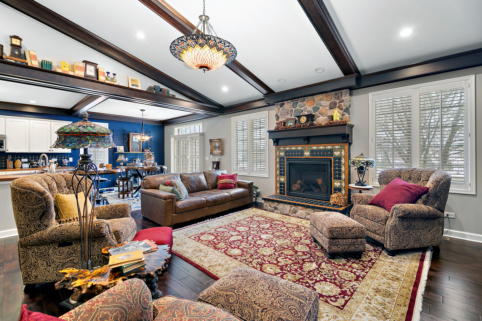 16665 Merc Lane Lockport, IL 60441 - Photo 13 of 54 a living room with furniture a flat screen tv and a fireplace