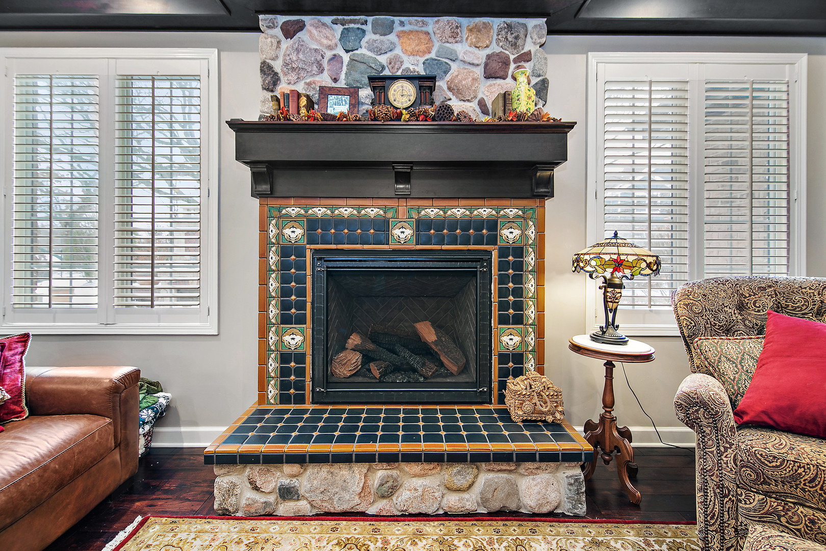 16665 Merc Lane Lockport, IL 60441 - Photo 17 of 54 a living room with furniture a rug and a fireplace