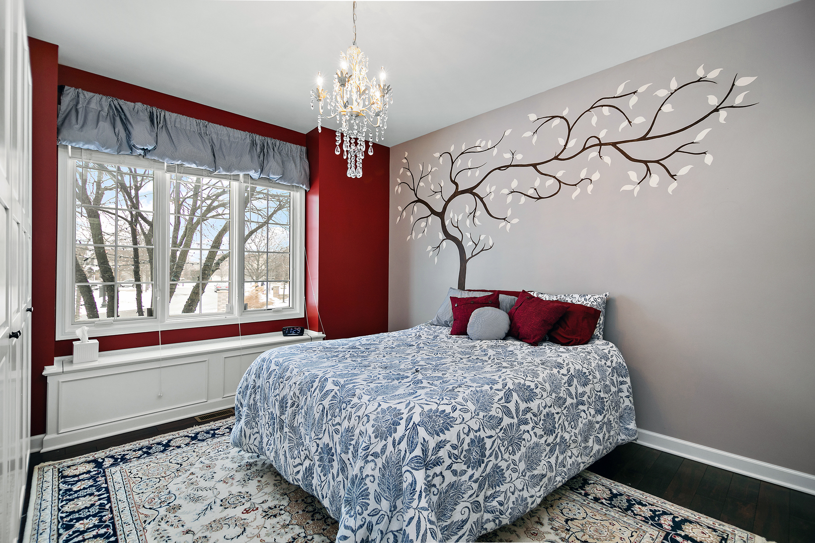 16665 Merc Lane Lockport, IL 60441 - Photo 29 of 54 a bedroom with a bed and a chandelier