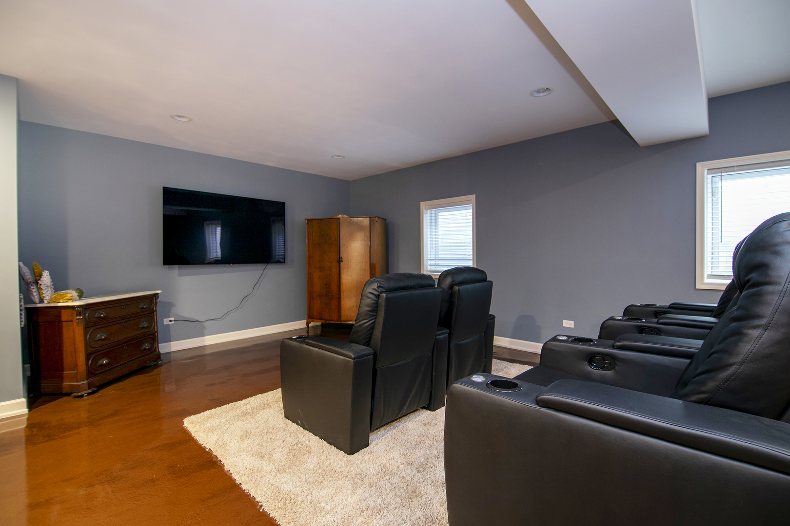 16665 Merc Lane Lockport, IL 60441 - Photo 36 of 54 a living room with furniture and a flat screen tv