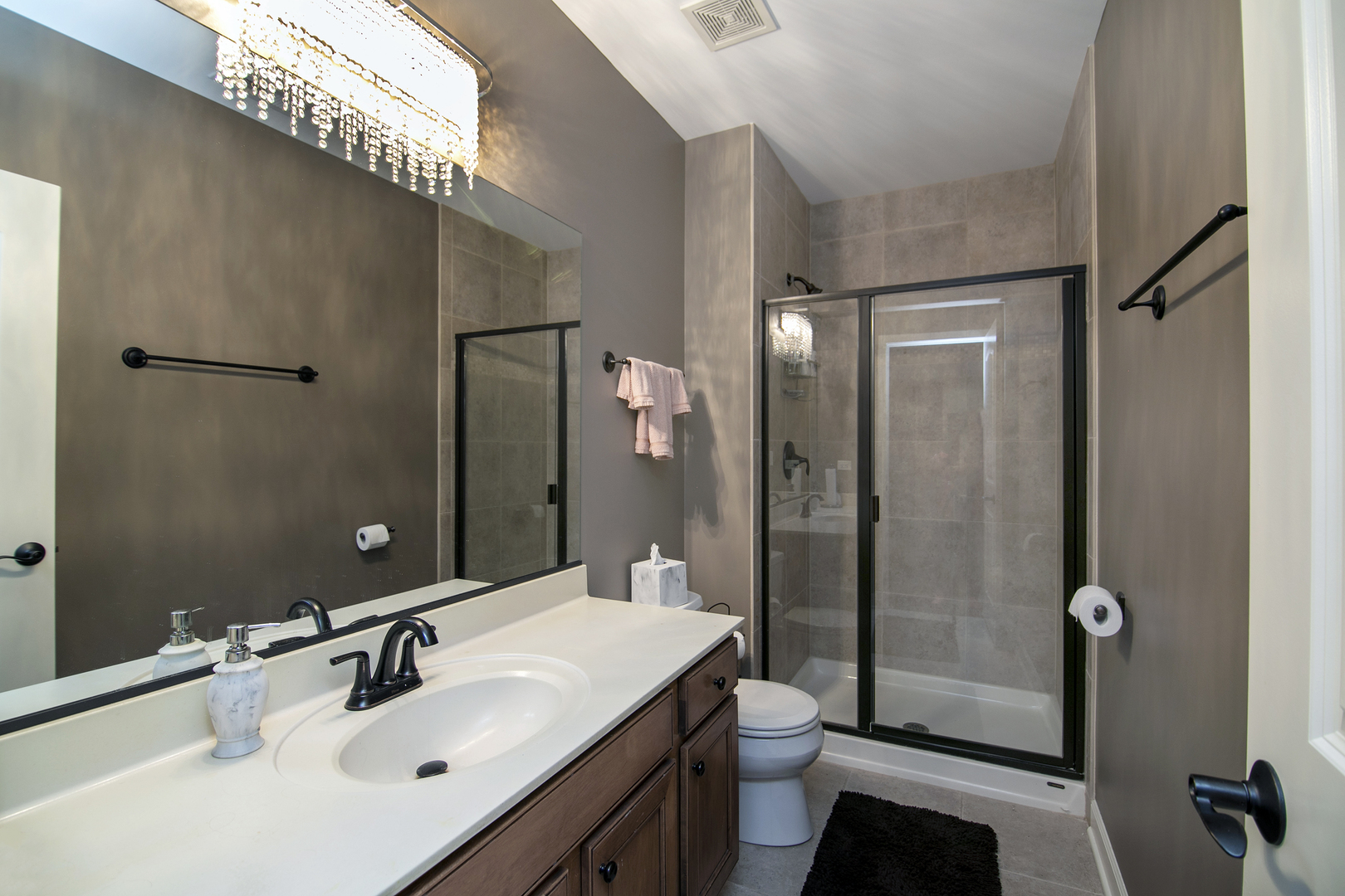 16665 Merc Lane Lockport, IL 60441 - Photo 37 of 54 a bathroom with a sink toilet and shower