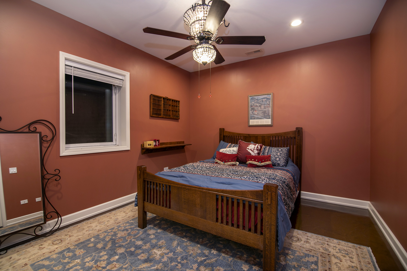 16665 Merc Lane Lockport, IL 60441 - Photo 39 of 54 a bedroom with a bed and a chandelier