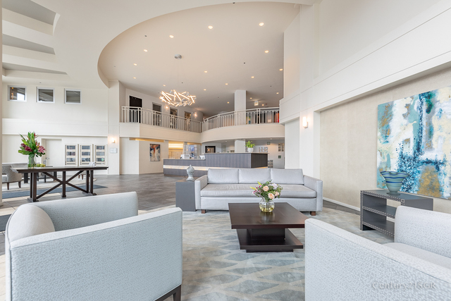 1000 West Adams Street, Unit 413 Chicago, IL 60607 - Photo 4 of 29 a living room with furniture and a large window