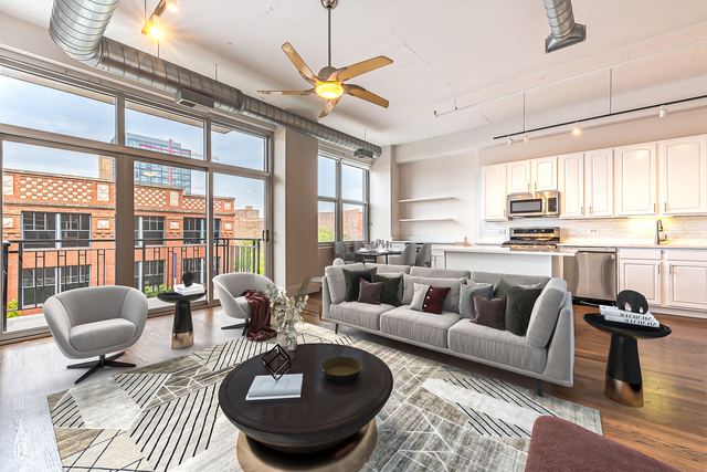 1000 West Adams Street, Unit 413 Chicago, IL 60607 - Photo 8 of 29 a living room with furniture and a large window