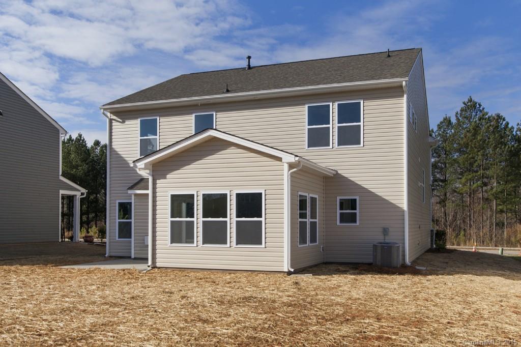 79475 Ridgehaven Road, Unit 43 Lancaster, SC 29720 - Photo 21 of 21 a front view of a house with a yard