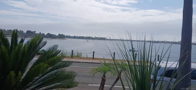 a view of a lake with a garden