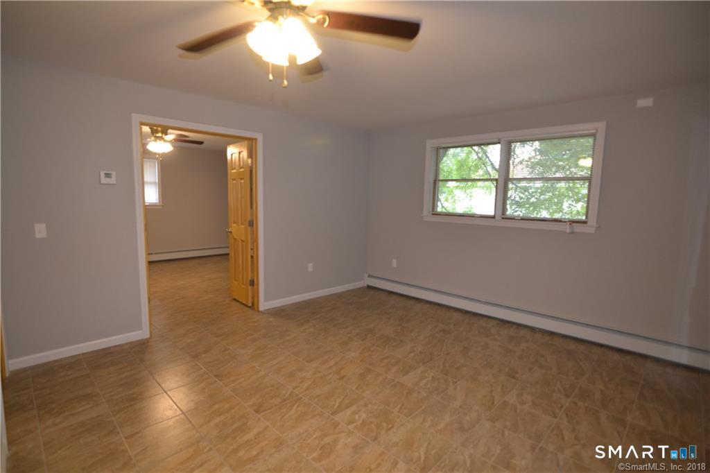 60 Central Boulevard Groton, CT 06340 - Photo 14 of 18 a view of an empty room with a window