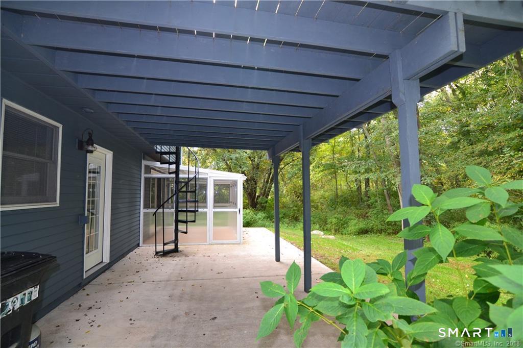60 Central Boulevard Groton, CT 06340 - Photo 17 of 18 a view of a porch with a backyard of a house