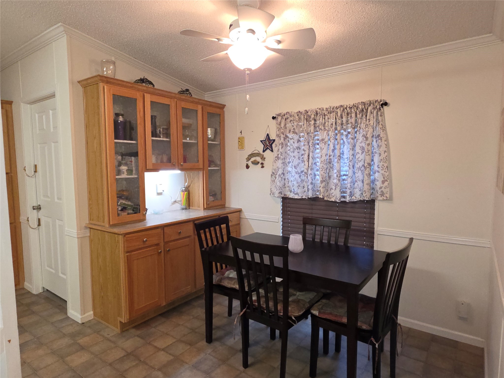 70 Montego Way Point Blank, TX 77364 - Photo 8 of 41 a view of a dining room with furniture and chandelier