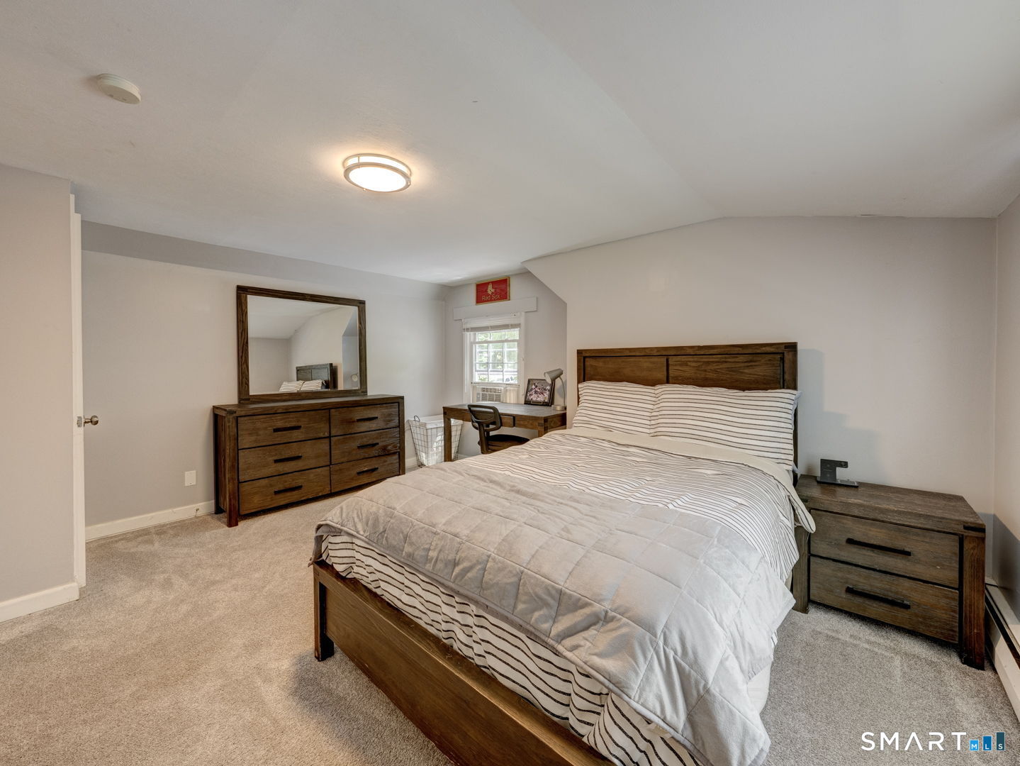 39 Freedom Drive Canton, CT 06019 - Photo 22 of 37 a bedroom with a bed and a dresser