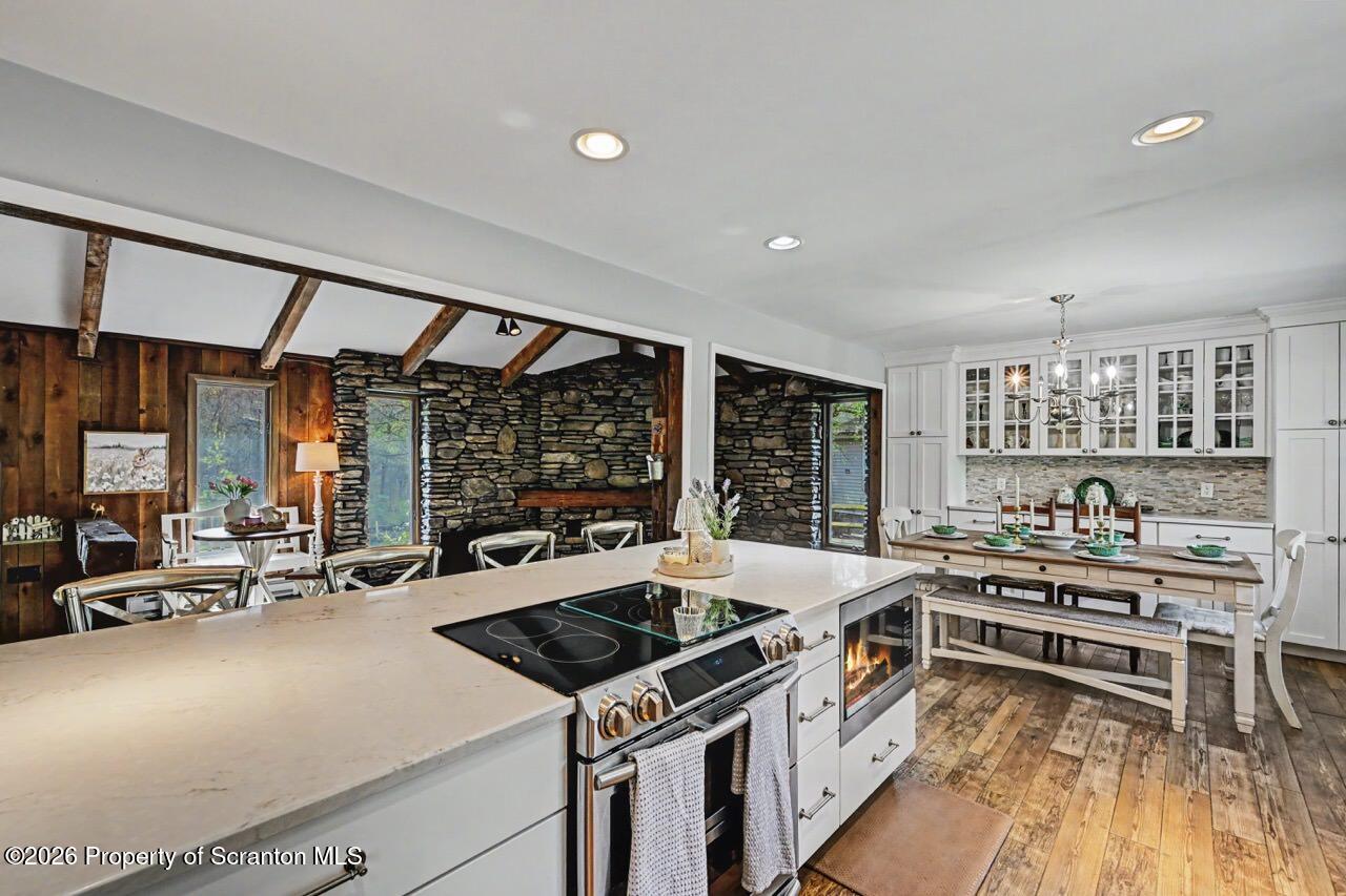 719 Scott Road Clarks Summit, PA 18411 - Photo 12 of 51 a kitchen that has a lot of chairs in it