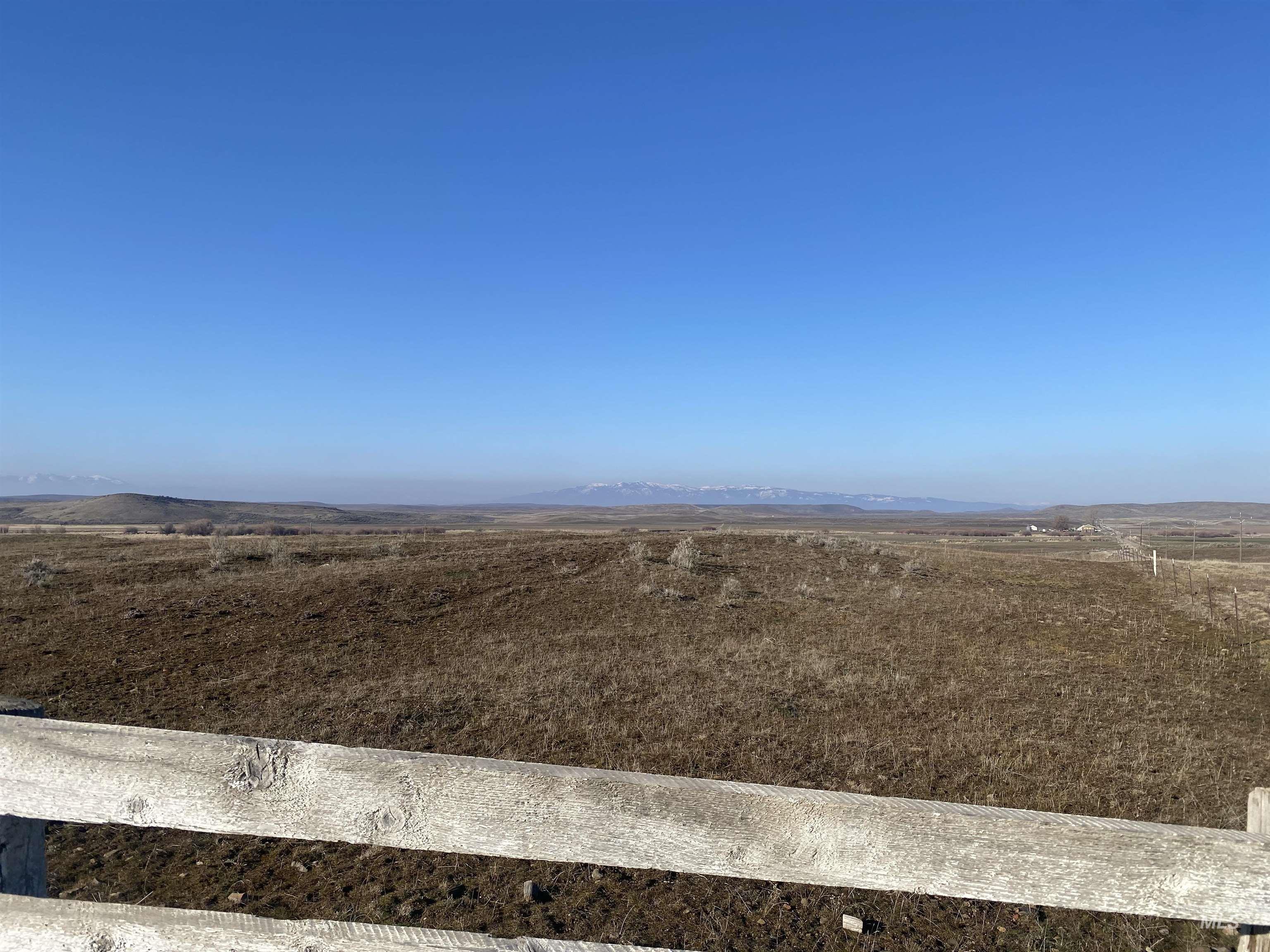 1691 North Crane Creek Road Midvale, ID 83645 - Photo 8 of 17 View of yard featuring a mountain view and a rural view