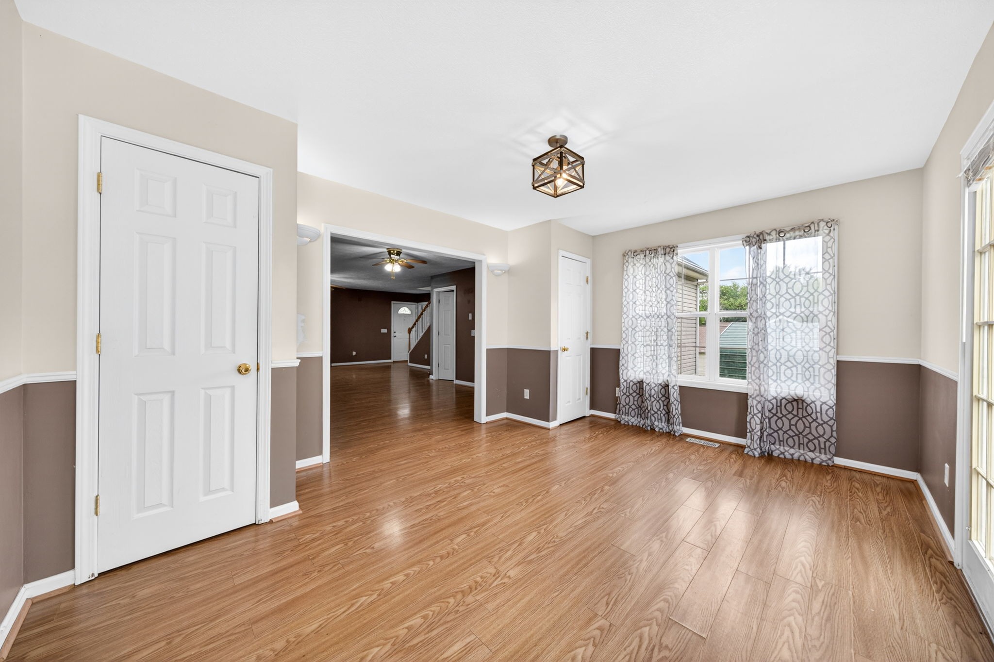 291 Poplar Point Lane Rickman, TN 38580 - Photo 14 of 41 an empty room with wooden floor and windows