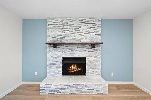 a living room with a fireplace