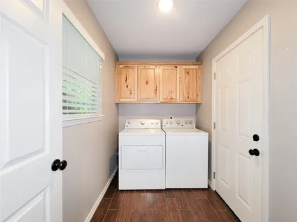 a view of utility room with washer and dryer