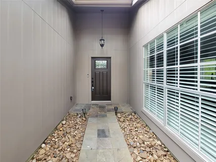 a view of bathroom with a window
