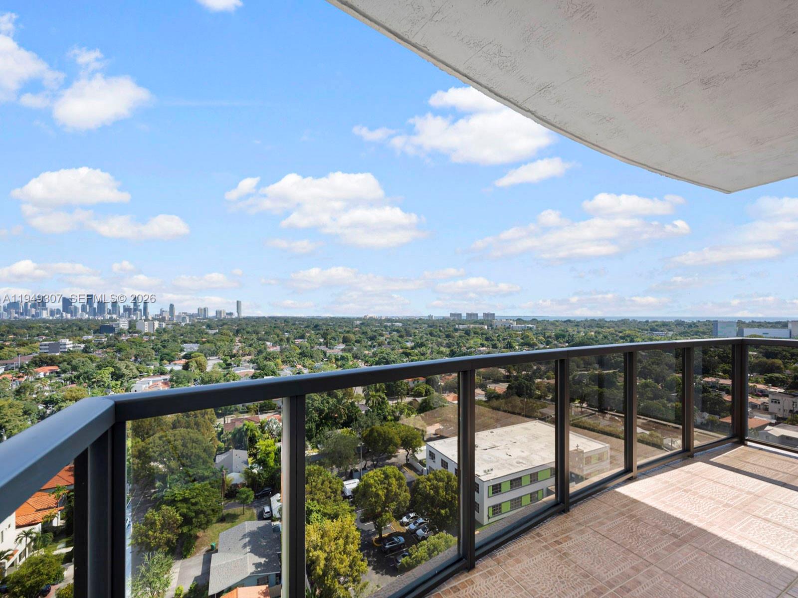 2301 Southwest 27th Avenue, Unit 1403 Miami, FL 33145 - Photo 15 of 53 Balcony off of living/dining room