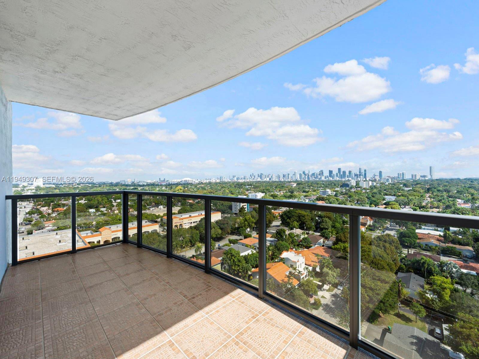 2301 Southwest 27th Avenue, Unit 1403 Miami, FL 33145 - Photo 16 of 53 Balcony off of living/dining room