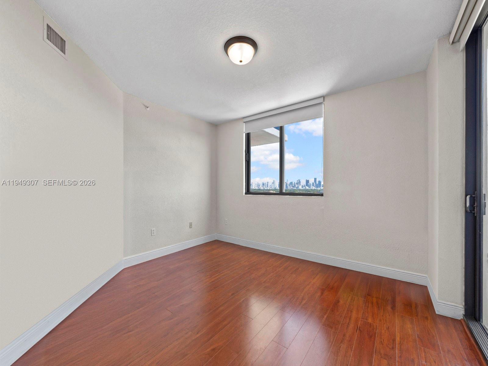 2301 Southwest 27th Avenue, Unit 1403 Miami, FL 33145 - Photo 30 of 53 2nd bedroom