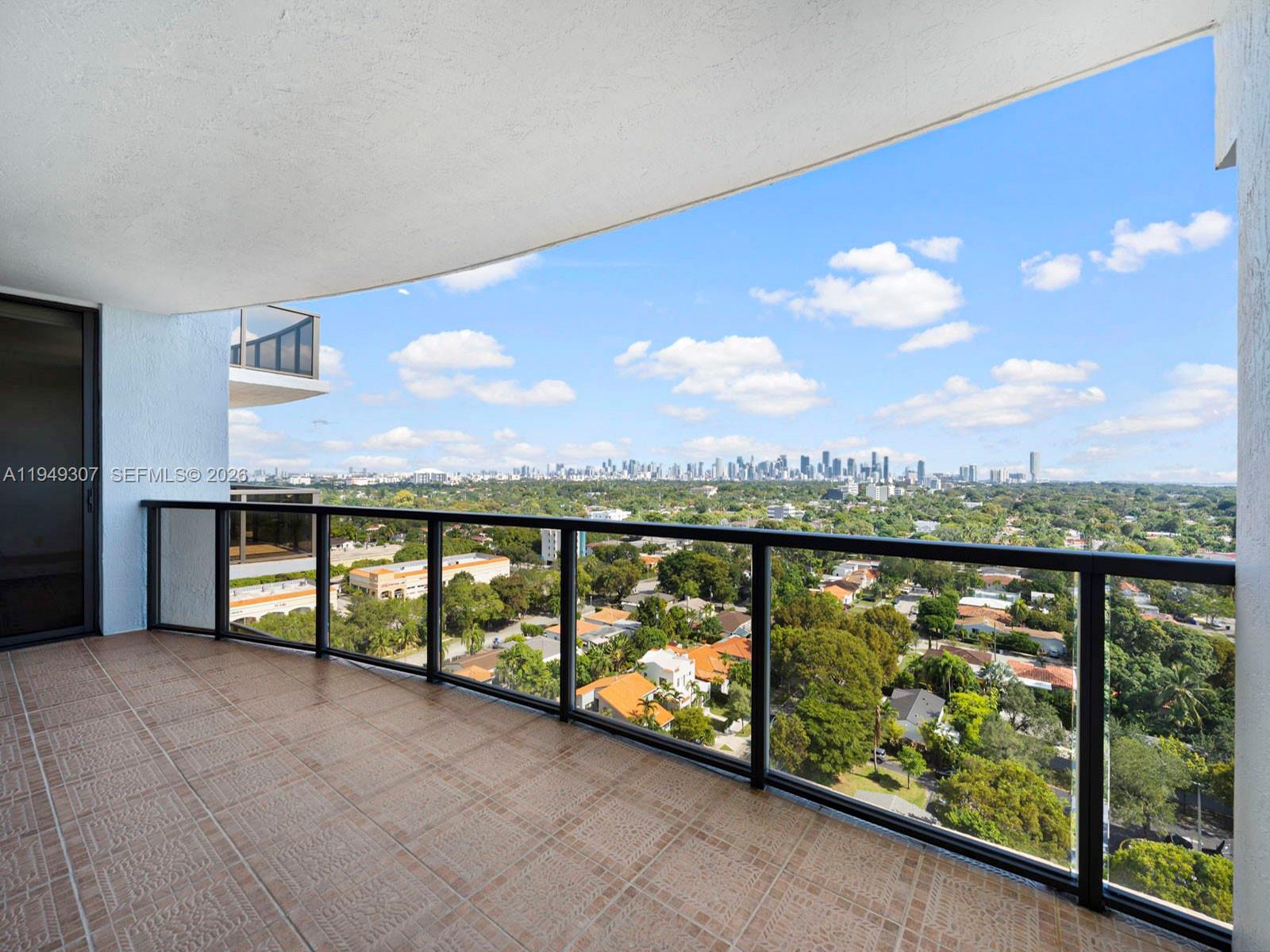 2301 Southwest 27th Avenue, Unit 1403 Miami, FL 33145 - Photo 33 of 53 Covered terrace off of 2nd bedroom