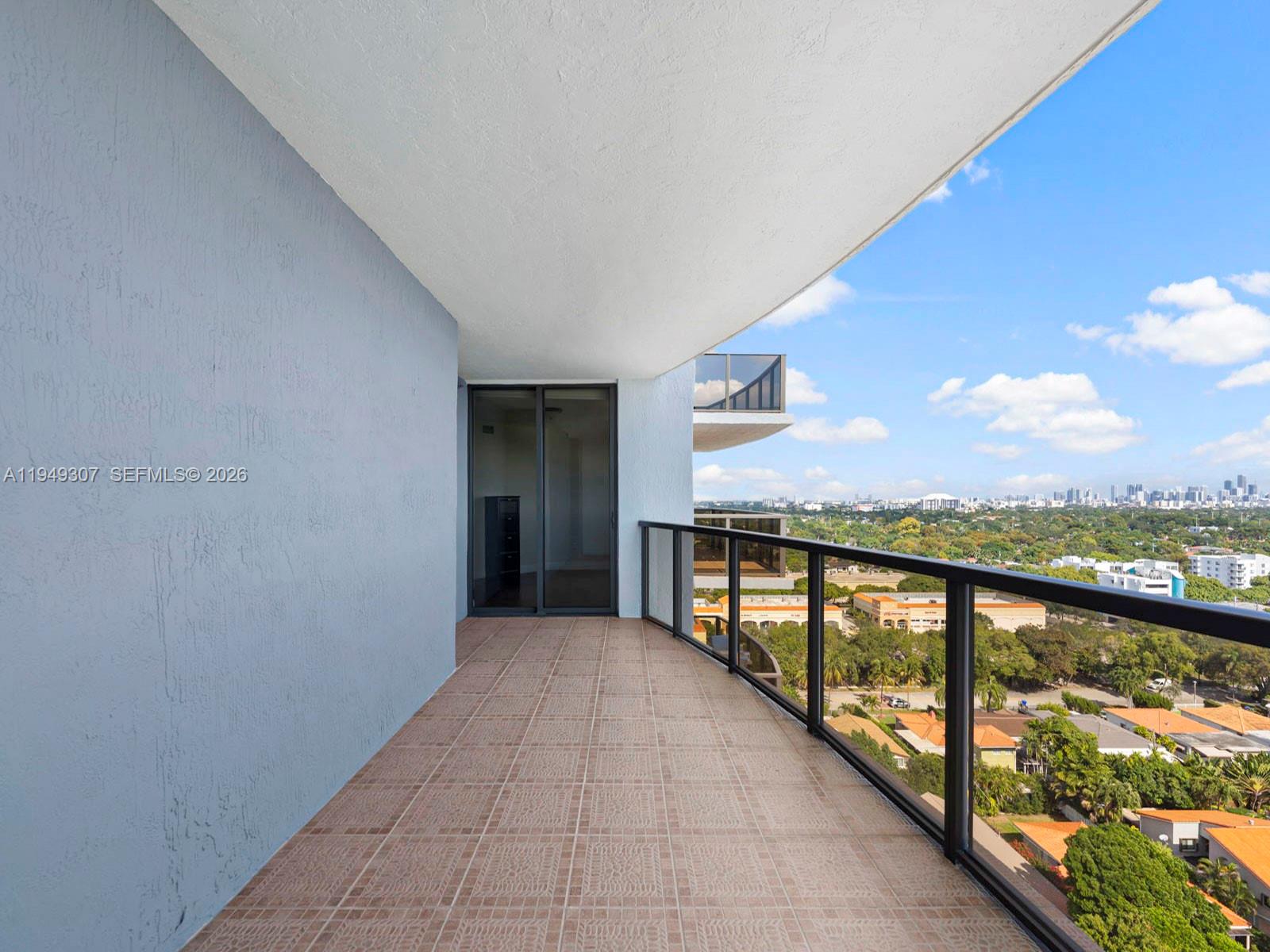 2301 Southwest 27th Avenue, Unit 1403 Miami, FL 33145 - Photo 34 of 53 Covered terrace off of 2nd bedroom