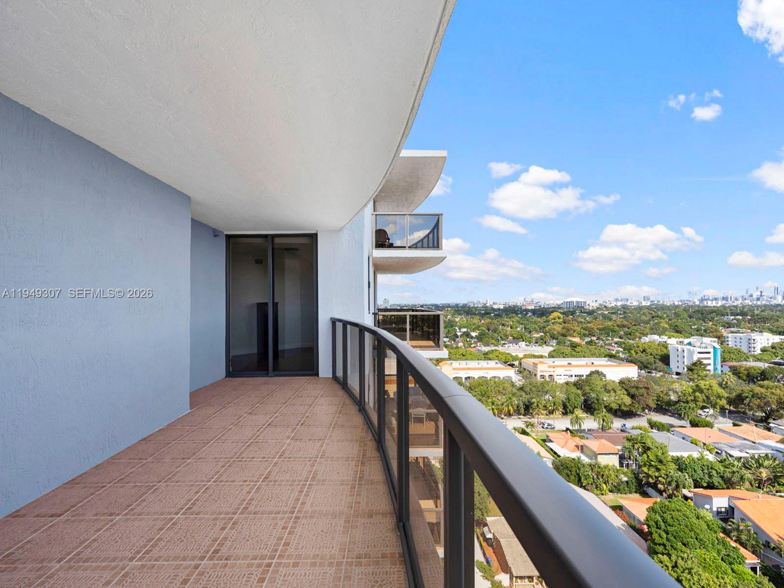 2301 Southwest 27th Avenue, Unit 1403 Miami, FL 33145 - Photo 35 of 53 Covered terrace off of 2nd bedroom