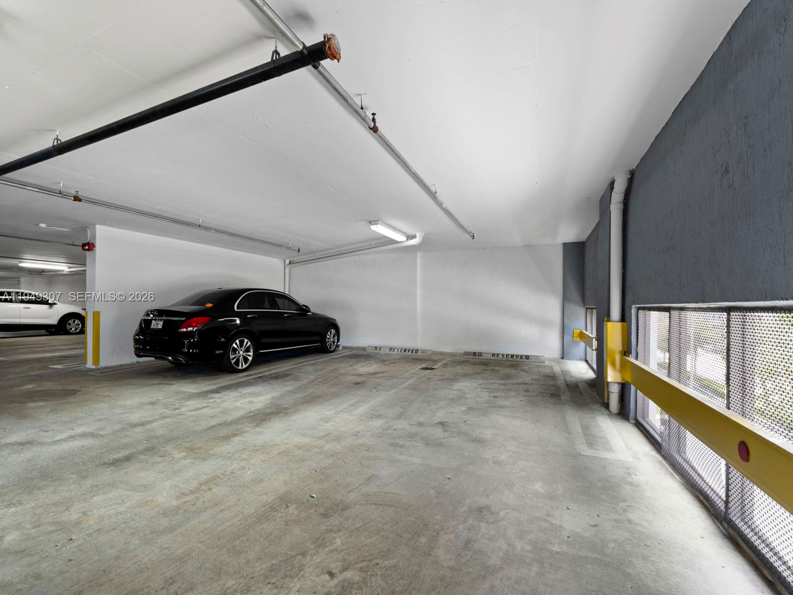 2301 Southwest 27th Avenue, Unit 1403 Miami, FL 33145 - Photo 52 of 53 2 side by side assigned parking spaces