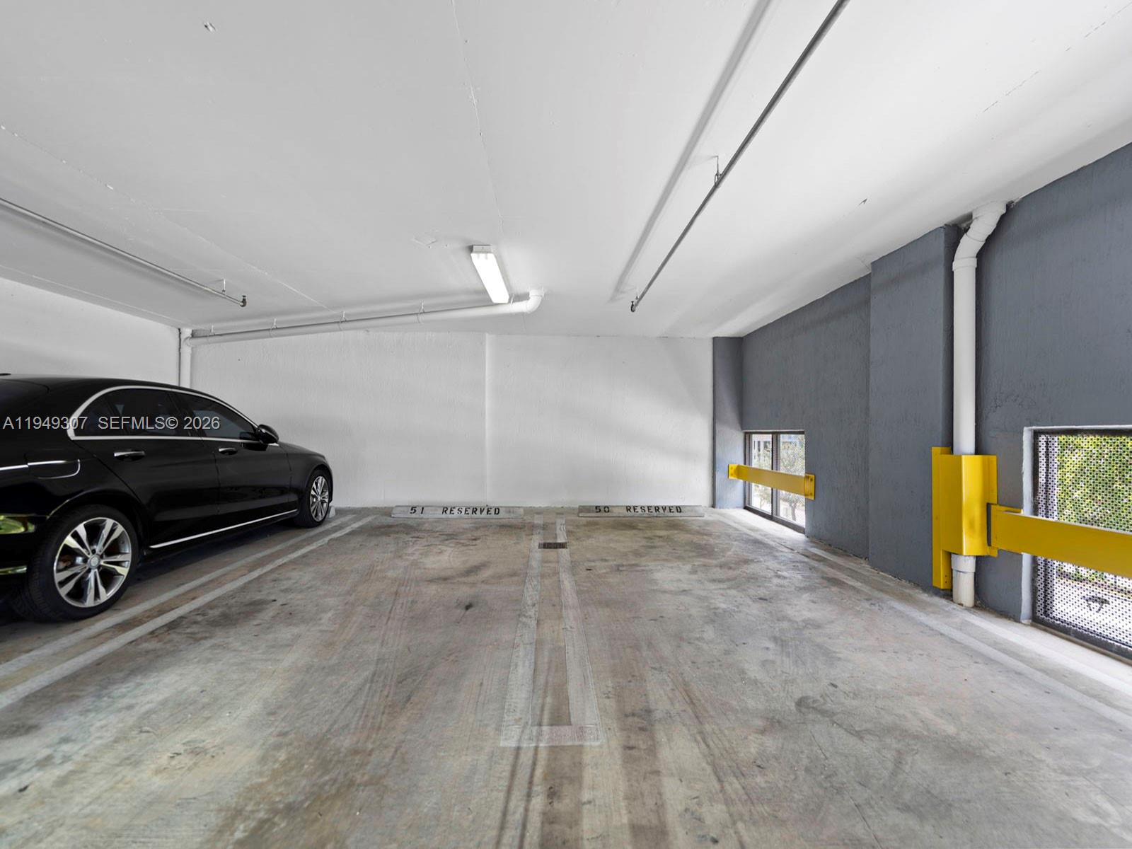 2301 Southwest 27th Avenue, Unit 1403 Miami, FL 33145 - Photo 53 of 53 2 side by side assigned parking spaces