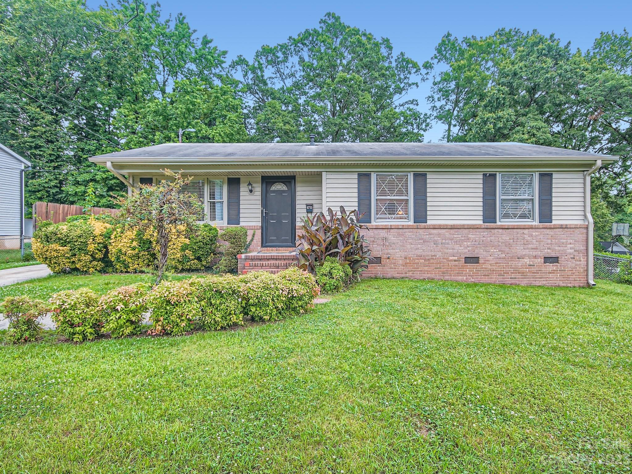 6715 Reddman Road Charlotte, NC 28212 - Photo 3 of 28 a view of house with a yard