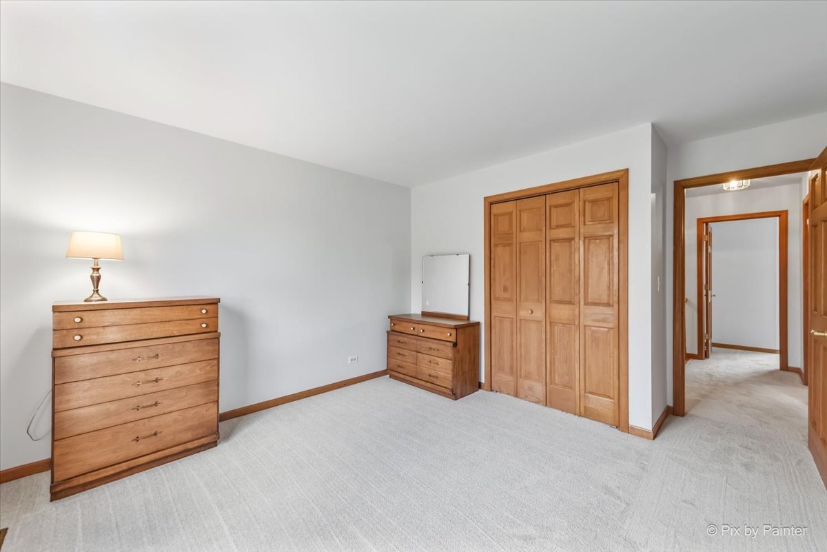 1405 Elk Trail Cary, IL 60013 - Photo 14 of 39 an empty room with furniture and a window