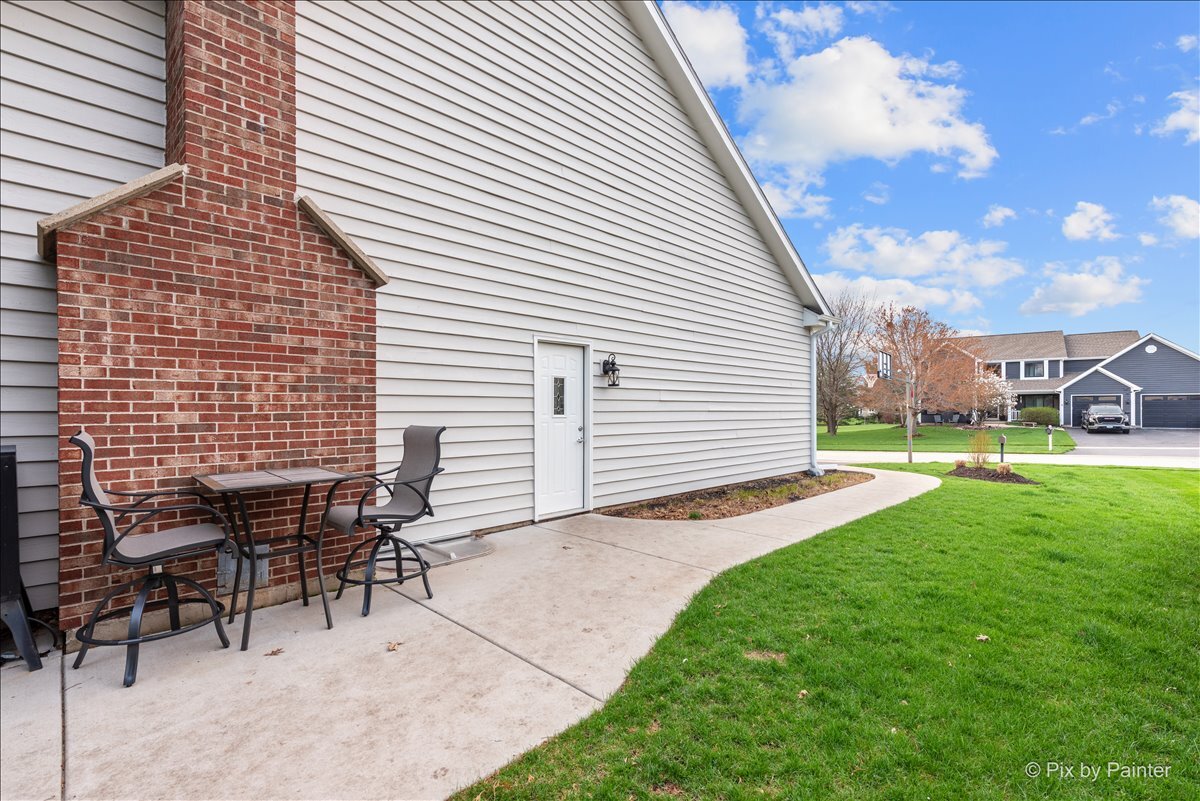 1405 Elk Trail Cary, IL 60013 - Photo 28 of 39 a view of backyard with sitting area