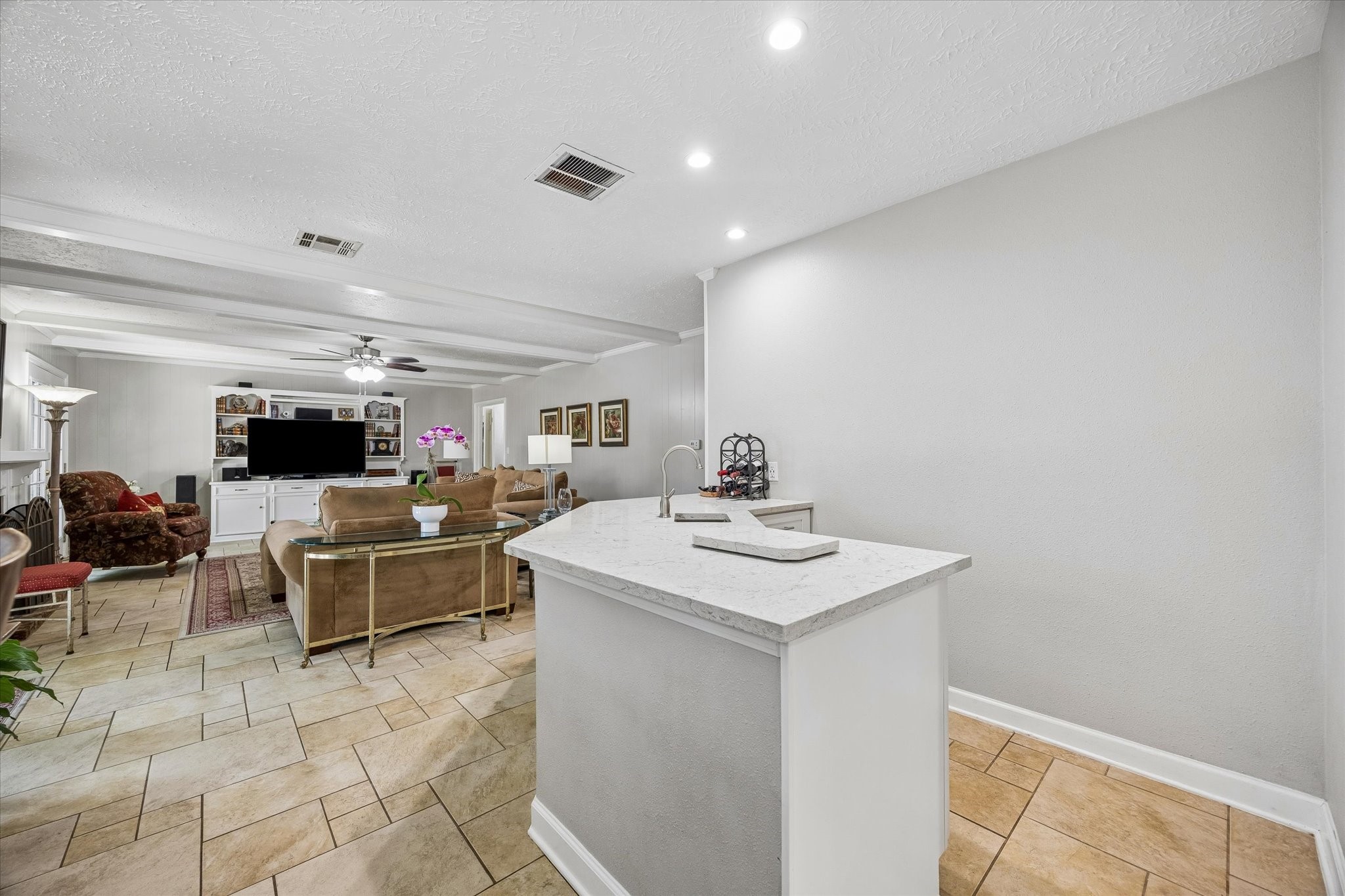 13926 Perthshire Road Houston, TX 77079 - Photo 11 of 31 Ideally positioned for entertaining, the wet bar provides a dedicated space for mixing and serving drinks, while the generous counter area is perfect for setting out appetizers, desserts or a full spread when hosting family and friends.