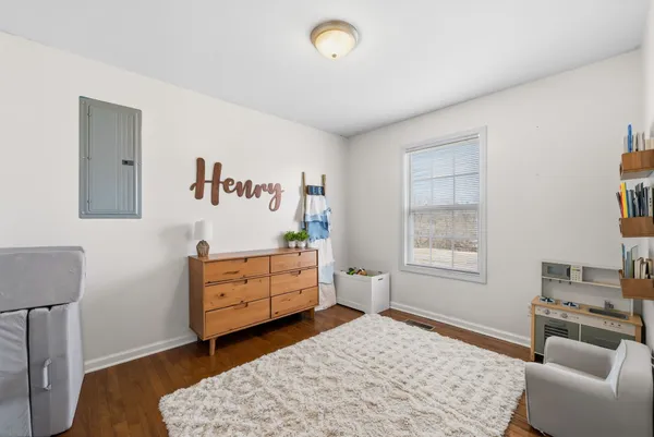 a bed room with a bed and a couch