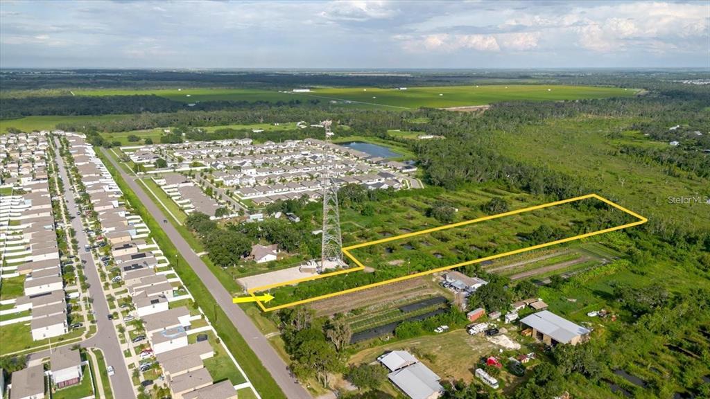 11105 Sumner Road Wimauma, FL 33598 - Photo 2 of 4 a view of a yard