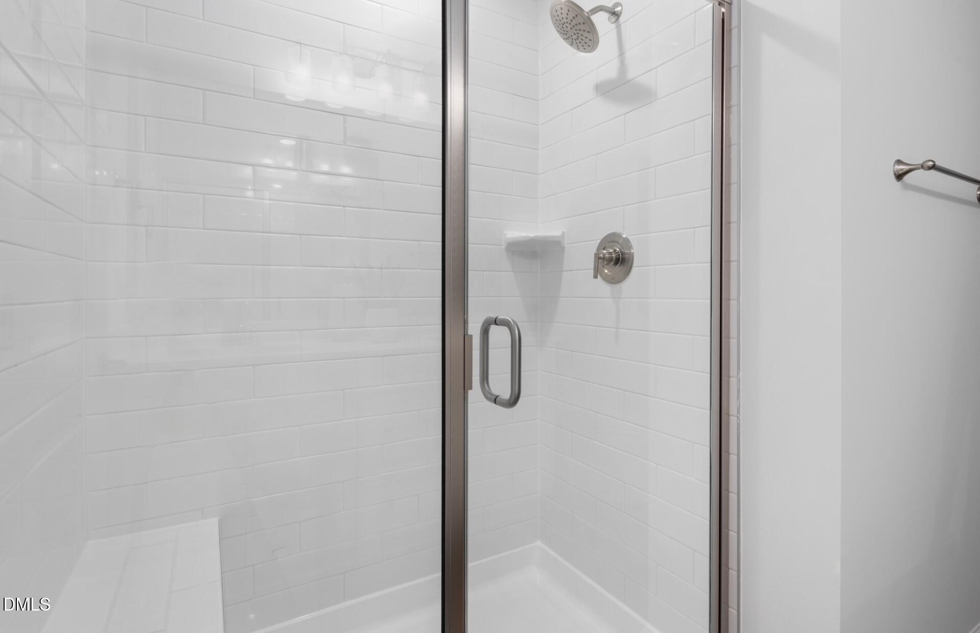 1118 Carpenter Falls Avenue Durham, NC 27704 - Photo 12 of 18 a bathroom with a shower