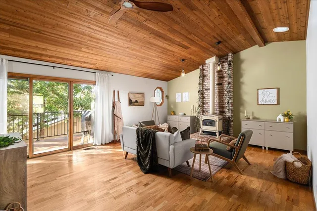 a kitchen with a stove a sink and a microwave