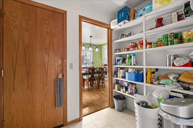 a view of snow on the street