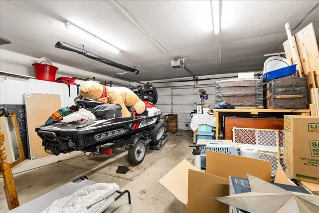 a view of a backyard with large tree