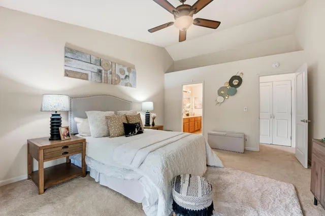 a en suite bathroom with double sink and a mirror
