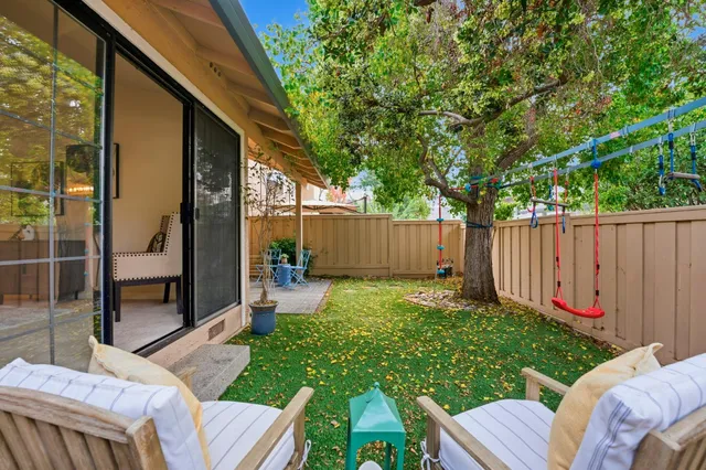 a view of swimming pool with lounge chair