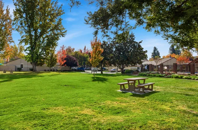 aerial view of a house with a yard