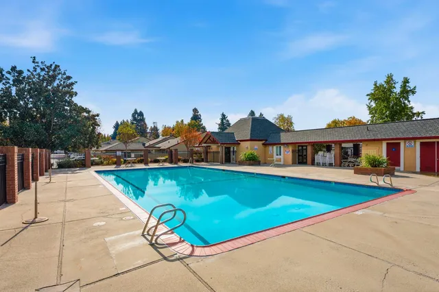 a view of a city with mountains in the background