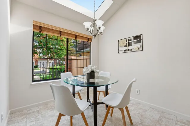 a kitchen with stainless steel appliances granite countertop a refrigerator sink and cabinets
